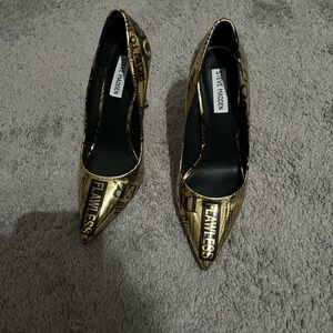 Steve Madden Black and Gold Text Heels